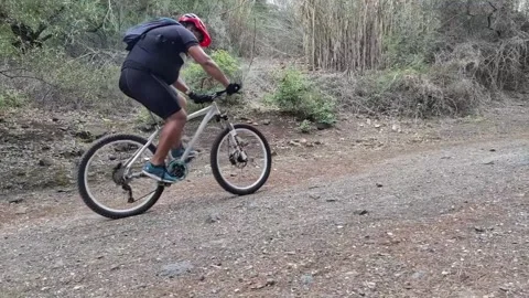 Guy Riding Bycicle 動画素材 164956290