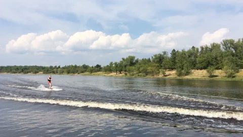 Guy riding his Wake Board Stock Footage 114297111