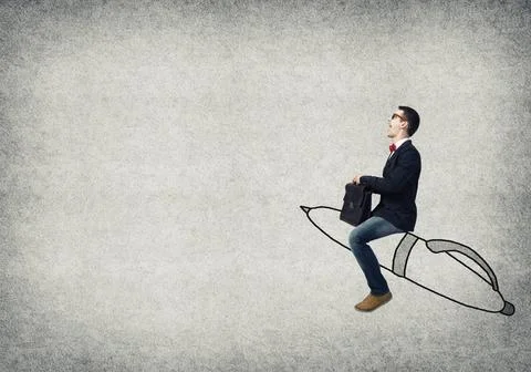 Guy riding pen Young man in glasses riding drawn pen on concrete backgroun... Foto stock