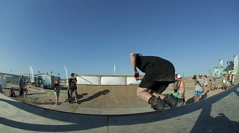 Guy Riding on Roller Skates on a Ramp Stock Footage 59438950