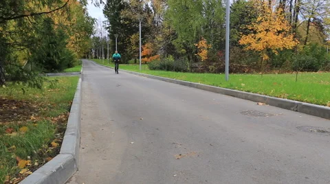 Guy riding on a scooter Vidéo 42183525