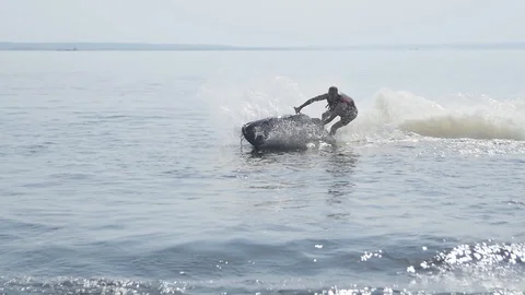 Guy is Riding a Water Motorcycle Stock Footage 87973242