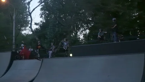 Guy on roller skate riding in a skate park Stock-Footage 103213213