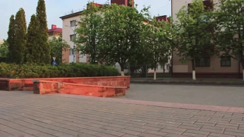 The guy roller skates in the evening in the city Stock Footage 130737680