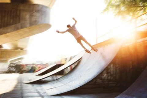 Guy rollerblading outdoors. Stock Photos