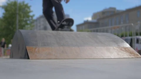 Guy is rolling down the hill Stock Footage 81810426