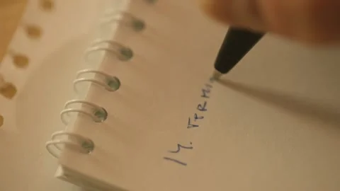 The guy in the room writes in a notebook3 Video stock 140051247
