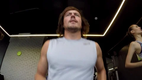 Guy Running on a Treadmill (Slow motion) Stock Footage 85156654