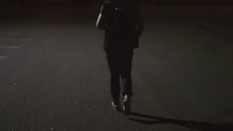 The guy runs away into the dark Stock Footage 130737838