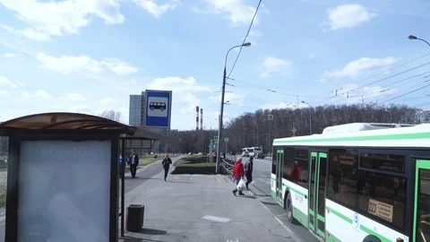 The guy runs behind the leaving bus Stock Footage 74444871