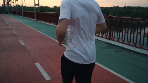 Guy runs in the city Stock Footage 117541390