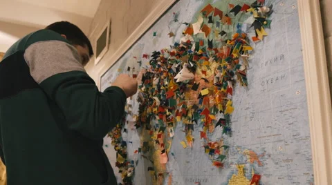 The guy says on the map of the capital Stock Footage 61393743