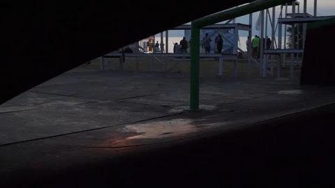 Guy on the scooter rolls down the springboard Video stock 102787650