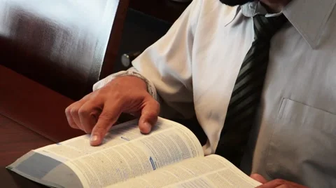 Guy searching Dictionary Stock Footage 51589790