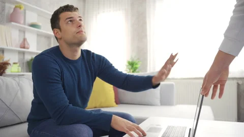 The guy selling his used computer. Video stock 220168672