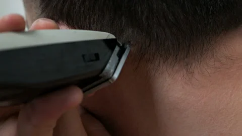 The guy shaves his head with a razor. Hair removal at home 스톡 동영상 121162392