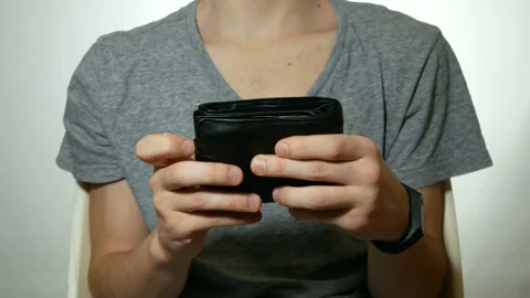 Guy showing empty purse Video stock 91008166