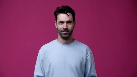 The guy shows a bank card on the camera and he likes it Stock Footage 162842211