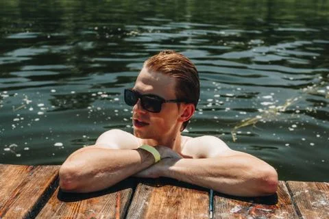 A guy at the side of the mooring. 写真素材