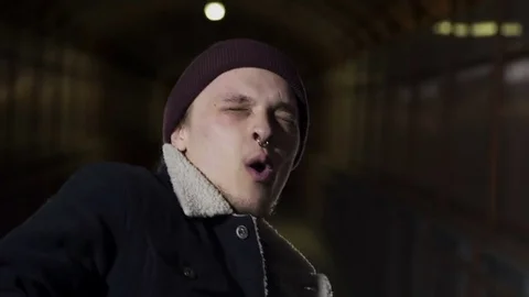 Guy sighs and looks at the camera Video stock 80480702