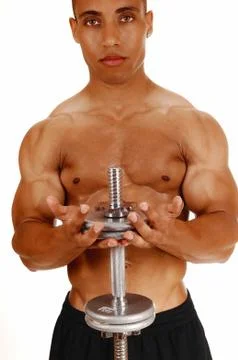 Guy with silver dumbbells. Stock Photos