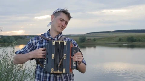  Guy Sincerely Plays the Accordion Stock Footage 87591220