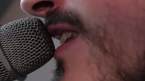 Guy singing into a microphone Stock Footage 51452126