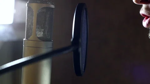The guy singing in the Studio Stock Footage 59873780