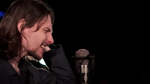 The guy sings in the dark Stock Footage 155182773