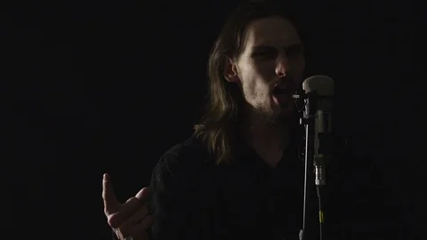 The guy sings in the Studio 스톡 동영상 100966608