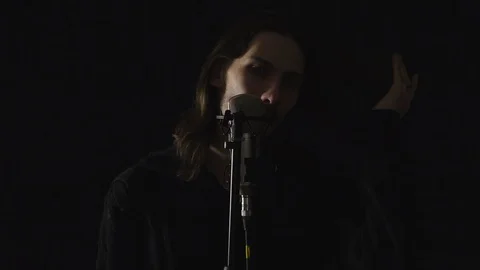 The guy sings in the Studio Stock Footage 101222488