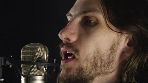 The guy sings in the Studio Stock Footage 101571075