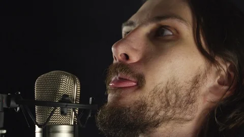 The guy sings in the Studio Stock Footage 101571301