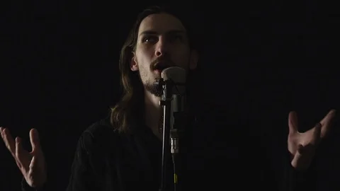 The guy sings in the Studio Stock Footage 104946885