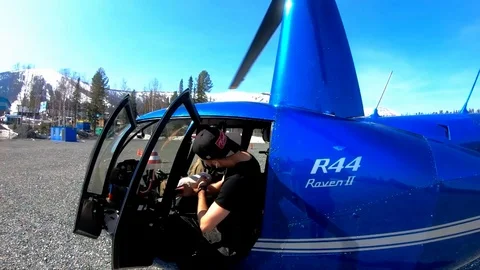 The guy sits in the helicopter. Slow Motion Stock Footage 107593573
