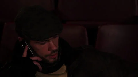 The guy sitting and talking with cellphone Stock Footage 34367151