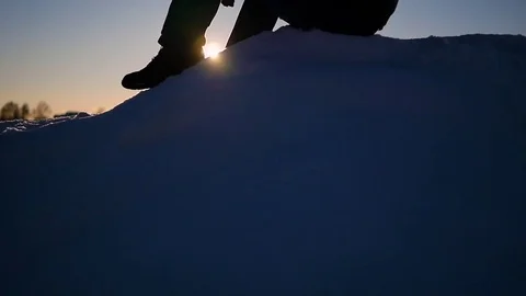 The guy sitting high on a snow slope. snow winter landscape. outdoors sports Video stock 71901171