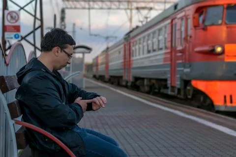 The guy sitting on the platform Stock Photos