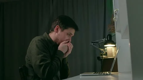 The guy sitting at the workplace coughs, is sick. Stock Footage 168863871