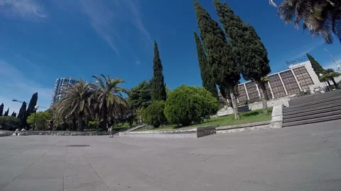 Guy on the skateboard jumps on the curb and slides on it Video stock 93844341