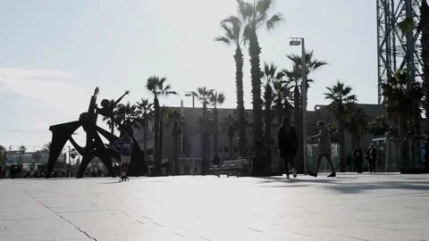 Guy Skateboarding On Placa Del Mar In Barcelona Slow-Motion HD Stock Footage 131567019