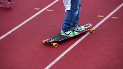 Guy skating with longboard Stock Footage 45990038