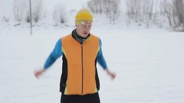 Guy skier doing exercises for body Video stock 86055040