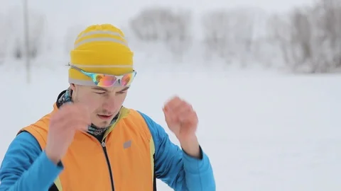 Guy skier puts on glasses Stock Footage 86009652