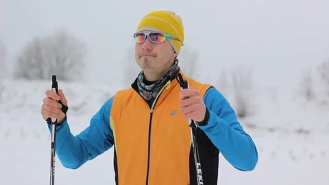 Guy skier in the snow-covered forest Stock Footage 86330281