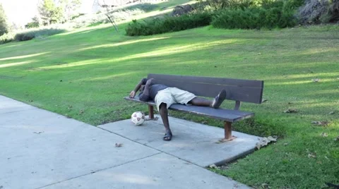 Guy Sleeping on Park Bench 3 Video stock 45434542