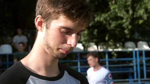 Guy with a slight smile on his lips Video stock 103650062
