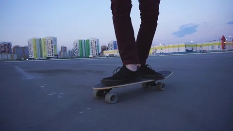 The guy in slow motion rides a longboard. Stock Footage 108059224