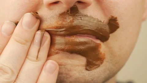 The Guy Smeared His Face With Chocolate Stock Footage 151218930