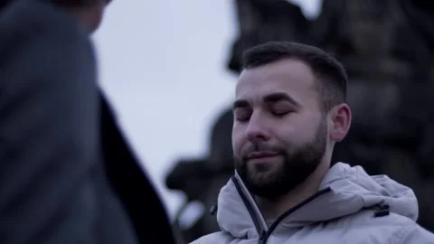 The guy smiles and looks at the guy Stock Footage 130743518